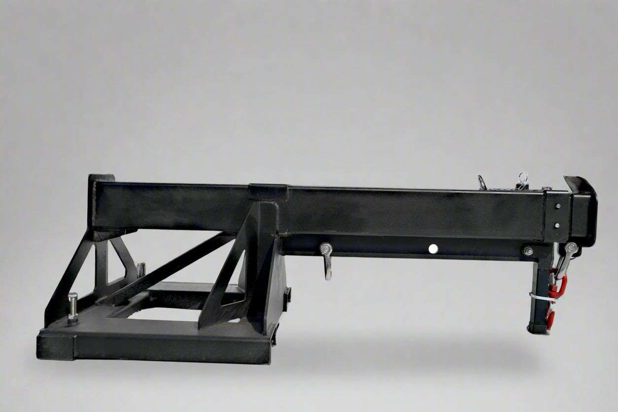 Adjustable skid steer jib boom on white background – extended view
Close-up of jib boom mounting to forklift tines
Forklift jib boom in telescoping position
6000 lb jib boom with dual swivel hooks
Fork-mounted heavy-duty boom – angled view