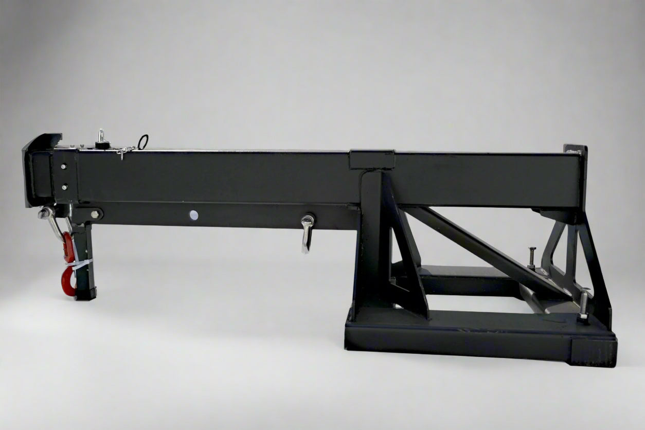 Adjustable skid steer jib boom on white background – extended view
Close-up of jib boom mounting to forklift tines
Forklift jib boom in telescoping position
6000 lb jib boom with dual swivel hooks
Fork-mounted heavy-duty boom – angled view