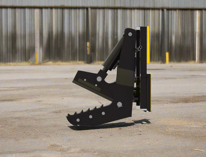 Rotating tree shear attachment mounted on skid steer
Side view of 965091 rotating tree cutter
Shear in upright rotation position
Hydraulic tree shear close-up view
965091 skid steer forestry attachment