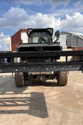 Skid Steer 72" Hydraulic Box Blade Leveler side view
Box grader with hydraulic rippers engaged
Attachment leveling gravel with skid steer
Close-up of pillow block bearings and rippers
Fully mounted box blade in action
