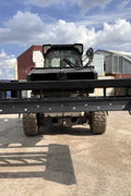 Skid Steer 72" Hydraulic Box Blade Leveler side view
Box grader with hydraulic rippers engaged
Attachment leveling gravel with skid steer
Close-up of pillow block bearings and rippers
Fully mounted box blade in action
