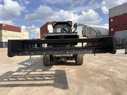 Skid Steer 72" Hydraulic Box Blade Leveler side view
Box grader with hydraulic rippers engaged
Attachment leveling gravel with skid steer
Close-up of pillow block bearings and rippers
Fully mounted box blade in action