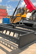 Skid Steer 72" Hydraulic Box Blade Leveler side view
Box grader with hydraulic rippers engaged
Attachment leveling gravel with skid steer
Close-up of pillow block bearings and rippers
Fully mounted box blade in action