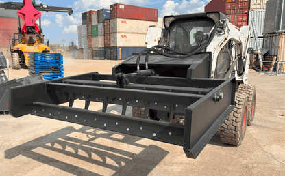 Skid Steer 72" Hydraulic Box Blade Leveler side view
Box grader with hydraulic rippers engaged
Attachment leveling gravel with skid steer
Close-up of pillow block bearings and rippers
Fully mounted box blade in action