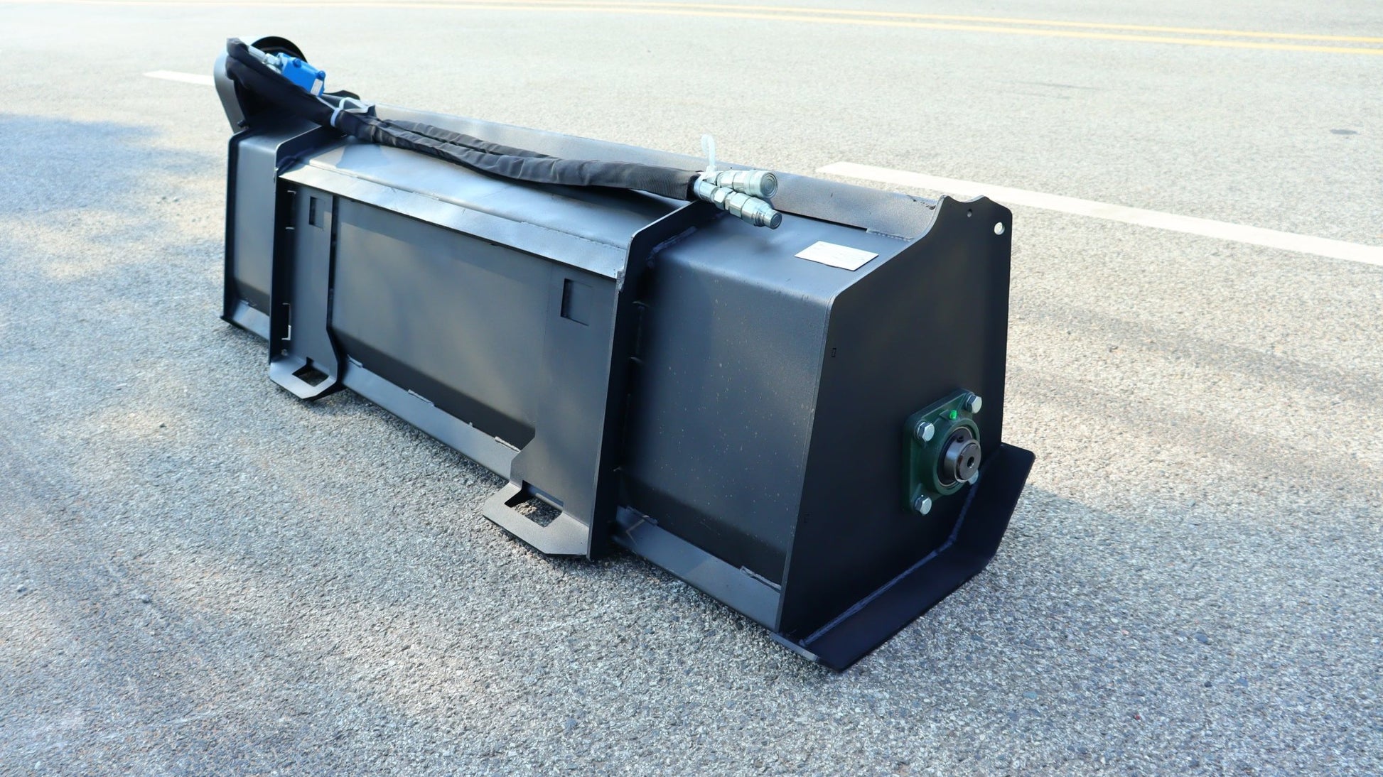 Top view of trenching skid steer attachment