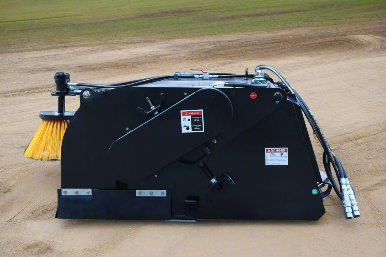 Skid Steer Bucket Sweeper with side broom mounted
Closeup of side broom attachment for skid steer
Top-down view of BBS210 sweeper brush
Hydraulic broom with enclosed dust cover
Front view of skid steer bucket sweeper system