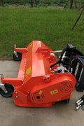 77" Skid Steer Flail Mower full front view
SSFM180 mower attachment from side angle
Hydraulic mower mounted on skid steer
Rear safety guard and roller of SSFM180
Top-down view of flail mower blades and frame