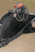 Skid steer hydraulic stump bucket grapple side view
Top view of stump grapple showing hydraulic cylinders
Open position of the stump bucket grapple attachment
Close-up of grapple jaws in action