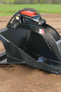 Skid steer hydraulic stump bucket grapple side view
Top view of stump grapple showing hydraulic cylinders
Open position of the stump bucket grapple attachment
Close-up of grapple jaws in action
