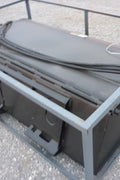 Skid steer bucket broom attachment with debris collected