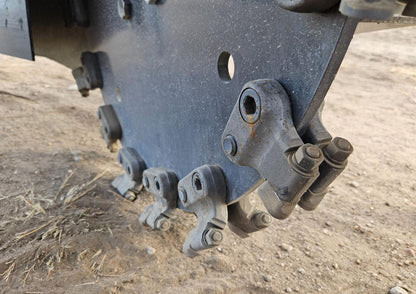 Hydraulic swing stump grinder attached to skid steer – front view
Side view of SG1308D stump grinder wheel and teeth
Close-up of carbide cutting wheel on stump grinder