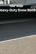 wide skid steer snow and mulch bucket with cutting edge