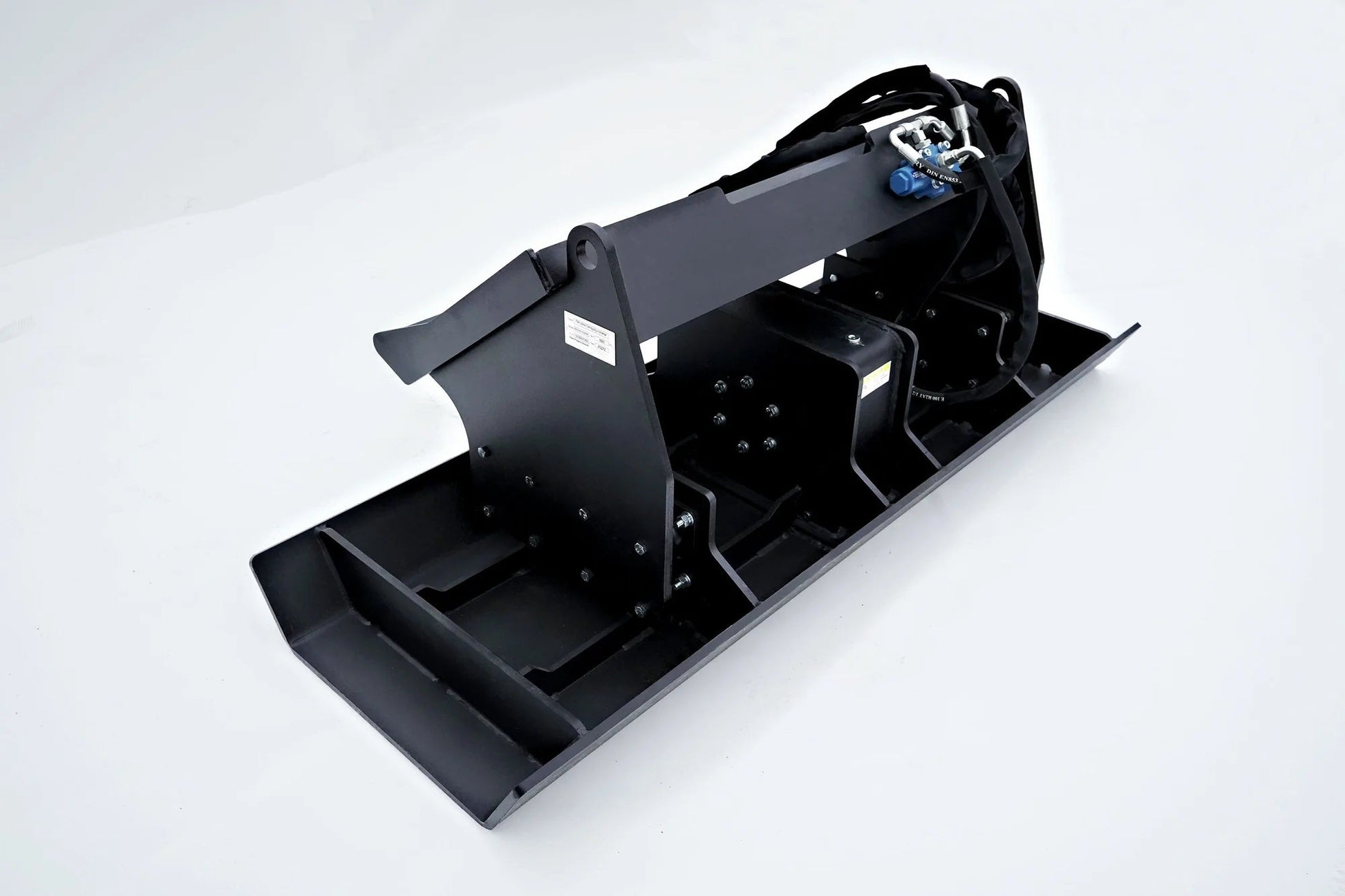 Skid Steer Plate Compactor front angled view
Skid Steer Compactor attachment side profile
Black vibratory plate compactor shown with quick attach
Compactor attachment for skid steer with wide working surface