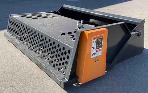 Front view of 84″ skid steer rock screener with hydraulic drum
Power root rake in action on construction site
Close-up of replaceable teeth on drum
Rear view showing universal skid steer mount
Heavy-duty rock rake screener with orange and black finish