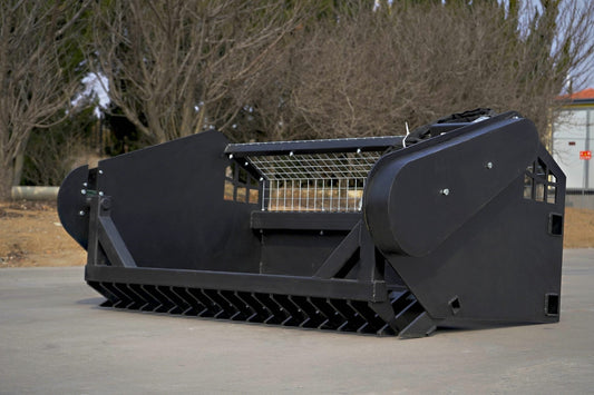 Skid steer rock screening bucket with 3.5-inch tine spacing
Bucket in use on a construction site
Top view of screening grid and rock separation
Side profile of mounted picker bucket
Black and gray job site rock screening attachment