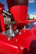 Extreme-duty red snow blower attachment for skid steer – front view

Hydraulic chute adjustment system on 84" snow blower model

72" skid steer snow blower attachment mounted for municipal use

Skid steer operator using snow blower in snowy mountain terrain

Rear hydraulic connection and chute control close-up on snow blower