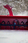 Extreme-duty red snow blower attachment for skid steer – front view

Hydraulic chute adjustment system on 84" snow blower model

72" skid steer snow blower attachment mounted for municipal use

Skid steer operator using snow blower in snowy mountain terrain

Rear hydraulic connection and chute control close-up on snow blower