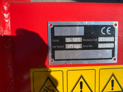 Extreme-duty red snow blower attachment for skid steer – front view

Hydraulic chute adjustment system on 84" snow blower model

72" skid steer snow blower attachment mounted for municipal use

Skid steer operator using snow blower in snowy mountain terrain

Rear hydraulic connection and chute control close-up on snow blower