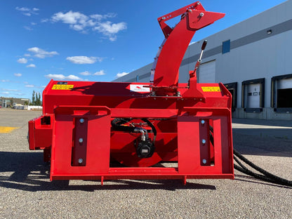 Extreme-duty red snow blower attachment for skid steer – front view

Hydraulic chute adjustment system on 84" snow blower model

72" skid steer snow blower attachment mounted for municipal use

Skid steer operator using snow blower in snowy mountain terrain

Rear hydraulic connection and chute control close-up on snow blower