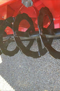 Extreme-duty red snow blower attachment for skid steer – front view

Hydraulic chute adjustment system on 84" snow blower model

72" skid steer snow blower attachment mounted for municipal use

Skid steer operator using snow blower in snowy mountain terrain

Rear hydraulic connection and chute control close-up on snow blower