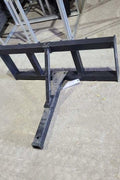 Skid steer trailer hitch attachment – front angled view
Hitch receiver close-up – Model 55763
Rear view of universal skid steer hitch
Trailer hitch mounted on skid steer