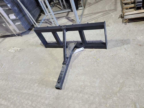 Skid steer trailer hitch attachment – front angled view
Hitch receiver close-up – Model 55763
Rear view of universal skid steer hitch
Trailer hitch mounted on skid steer