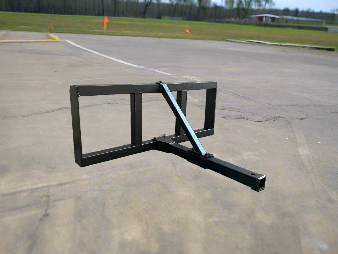 Skid steer trailer hitch attachment – front angled view
Hitch receiver close-up – Model 55763
Rear view of universal skid steer hitch
Trailer hitch mounted on skid steer