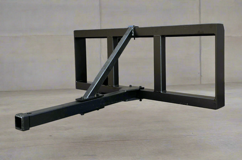 Skid steer trailer hitch attachment – front angled view
Hitch receiver close-up – Model 55763
Rear view of universal skid steer hitch
Trailer hitch mounted on skid steer