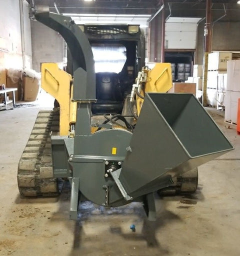 BX42 wood chipper attachment side view
Front-facing view of skid steer wood chipper BX42
Close-up of BX42 hydraulic chute and rotor
Rear view showing input hopper and feed
Mounted BX42 chipper on skid steer