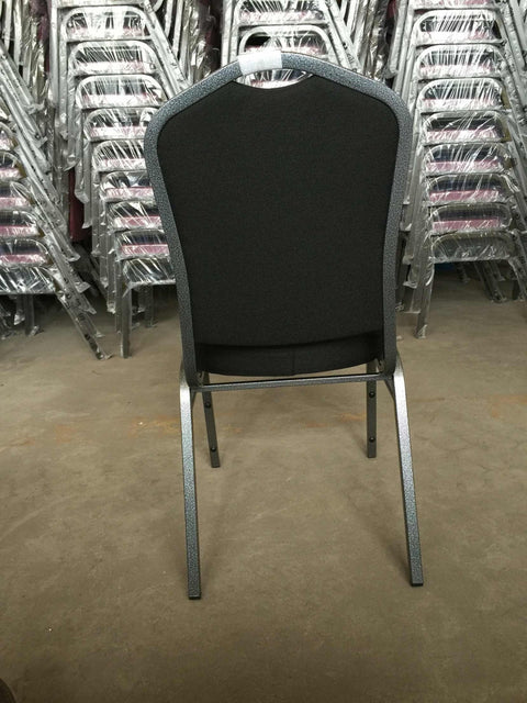 Stackable Banquet Chair – Black Dot Upholstery – Angled Front

Banquet Chairs in Row – Side View

Black Event Chairs in Use at Corporate Event

Commercial Banquet Seating – Stackable Design