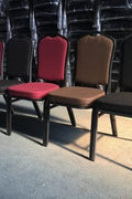 Stackable Banquet Chair – Black Dot Upholstery – Angled Front

Banquet Chairs in Row – Side View

Black Event Chairs in Use at Corporate Event

Commercial Banquet Seating – Stackable Design