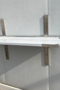 Stainless steel wall-mounted shelf front view

Close-up of shelf bracket and mounting

Side view of stainless steel shelf over prep station

Commercial wall shelf above kitchen counter

Single-tier wall shelf with polished finish