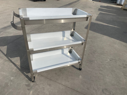 Stainless steel 3-tier kitchen trolley cart front view

Rolling utility shelf for commercial kitchens

3-shelf stainless steel transport cart with wheels

Commercial-grade stainless steel mobile cart

Trolley with locking caster wheels for food service