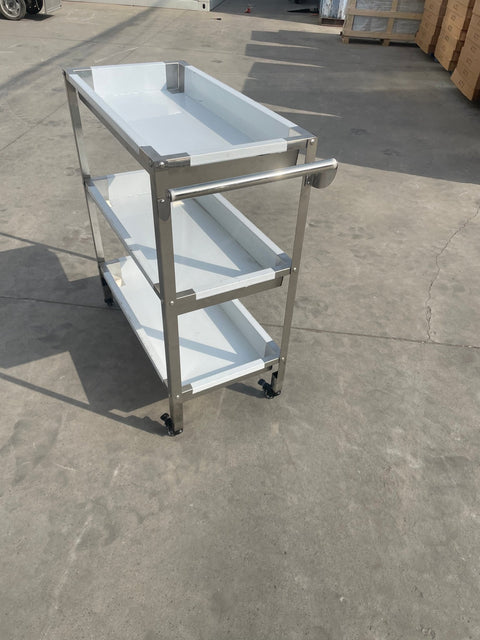 Stainless steel 3-tier kitchen trolley cart front view

Rolling utility shelf for commercial kitchens

3-shelf stainless steel transport cart with wheels

Commercial-grade stainless steel mobile cart

Trolley with locking caster wheels for food service