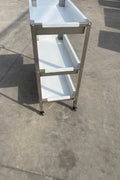 Stainless steel 3-tier kitchen trolley cart front view

Rolling utility shelf for commercial kitchens

3-shelf stainless steel transport cart with wheels

Commercial-grade stainless steel mobile cart

Trolley with locking caster wheels for food service