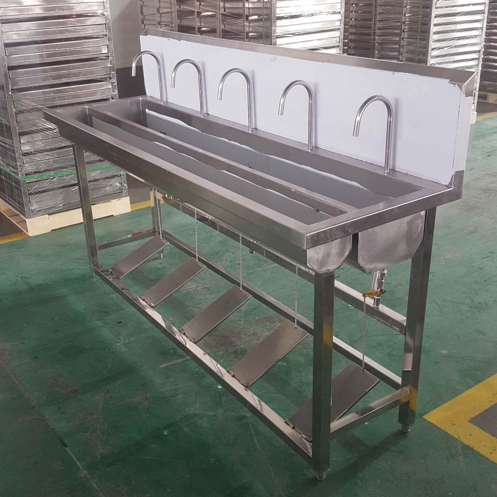 Stainless steel 5-person hygiene sink front view

Foot pedal–operated multi-user wash station

Portable stainless steel hand washing unit for outdoor use

