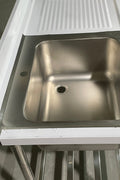 Stainless steel sink with right drainboard and backsplash

Freestanding commercial sink for food prep

Single bowl kitchen sink with undershelf

Heavy-duty stainless sink station front view

Restaurant-grade sink unit with drainboard