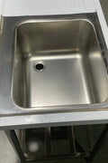 Stainless steel sink with right drainboard and backsplash

Freestanding commercial sink for food prep

Single bowl kitchen sink with undershelf

Heavy-duty stainless sink station front view

Restaurant-grade sink unit with drainboard