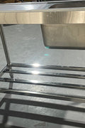 Stainless steel sink with right drainboard and backsplash

Freestanding commercial sink for food prep

Single bowl kitchen sink with undershelf

Heavy-duty stainless sink station front view

Restaurant-grade sink unit with drainboard