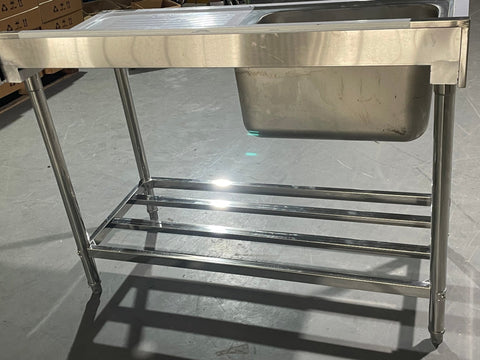 Stainless steel sink with right drainboard and backsplash

Freestanding commercial sink for food prep

Single bowl kitchen sink with undershelf

Heavy-duty stainless sink station front view

Restaurant-grade sink unit with drainboard