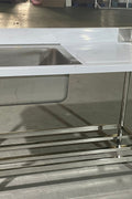 Stainless steel sink with right drainboard and backsplash

Freestanding commercial sink for food prep

Single bowl kitchen sink with undershelf

Heavy-duty stainless sink station front view

Restaurant-grade sink unit with drainboard