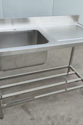 Stainless steel sink with right drainboard and backsplash

Freestanding commercial sink for food prep

Single bowl kitchen sink with undershelf

Heavy-duty stainless sink station front view

Restaurant-grade sink unit with drainboard