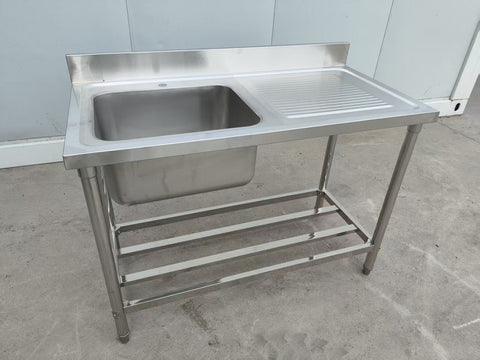 Stainless steel sink with right drainboard and backsplash

Freestanding commercial sink for food prep

Single bowl kitchen sink with undershelf

Heavy-duty stainless sink station front view

Restaurant-grade sink unit with drainboard