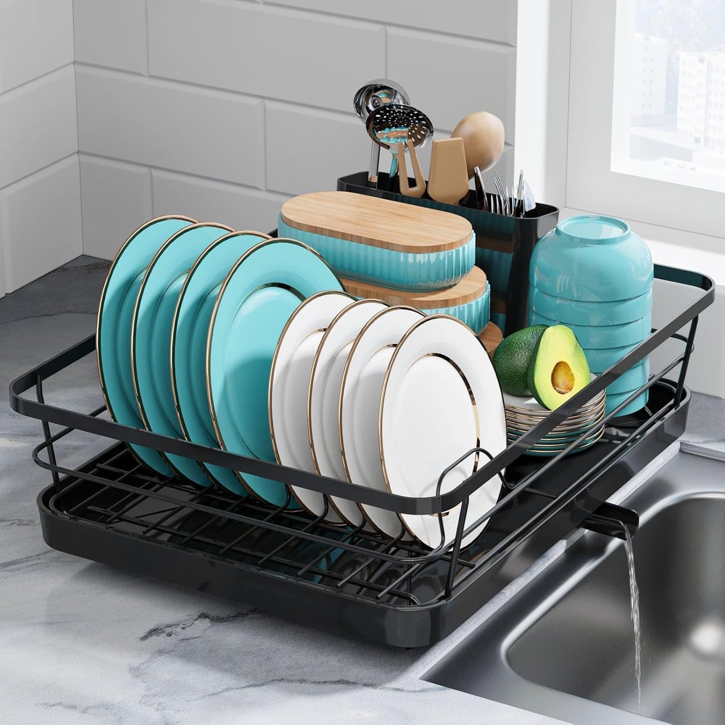 Compact stainless steel dish rack with white bowls and plates

Close-up of drainboard draining water into sink

Side view of dish rack showing utensil holder

All parts of dish rack laid out for assembly

Stainless steel rack in modern kitchen setting
