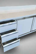 Stainless steel cabinet table front view

Industrial workbench with drawers and soft-close doors

Side angle of stainless steel garage workstation