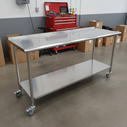 Stainless steel rolling work table with locking wheels – front view

48-inch stainless steel prep station with under-shelf and casters

72-inch commercial kitchen table with wheels – side angle

Mobile food service prep table with heavy-duty design

Industrial stainless table in warehouse environment