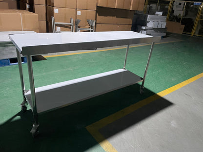 Stainless steel rolling work table with locking wheels – front view

48-inch stainless steel prep station with under-shelf and casters

72-inch commercial kitchen table with wheels – side angle

Mobile food service prep table with heavy-duty design

Industrial stainless table in warehouse environment
