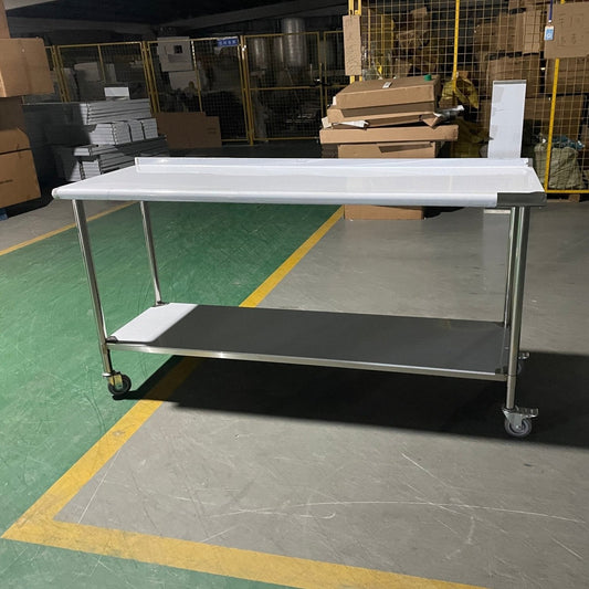 Stainless steel rolling work table with locking wheels – front view

48-inch stainless steel prep station with under-shelf and casters

72-inch commercial kitchen table with wheels – side angle

Mobile food service prep table with heavy-duty design

Industrial stainless table in warehouse environment