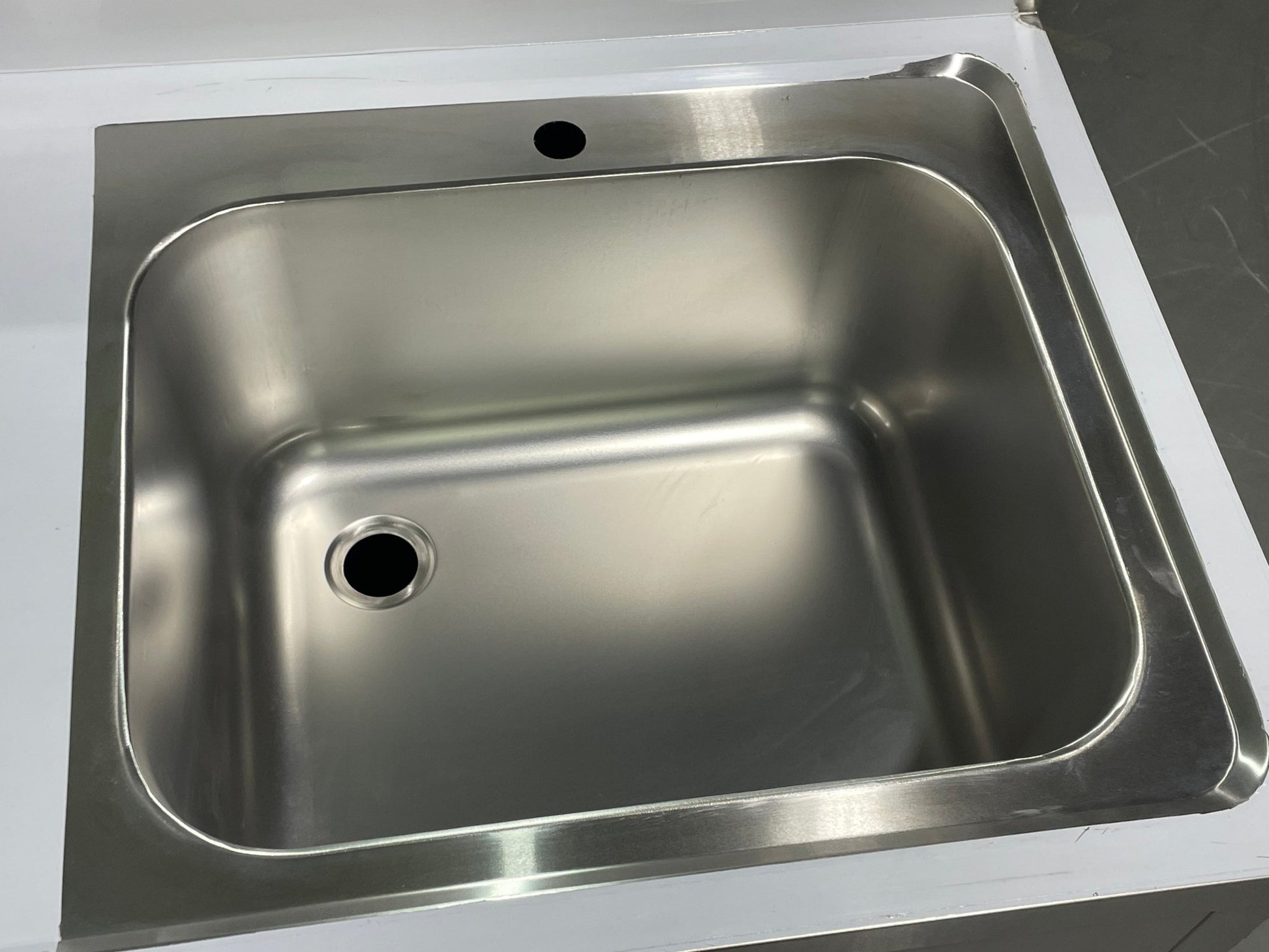 Stainless steel utility sink with 3 drawers front view

Commercial sink cabinet for restaurant or kitchen use

Stainless sink station with pull-out storage drawers

Industrial-grade sink unit with integrated storage

Compact kitchen sink workstation for food prep areas