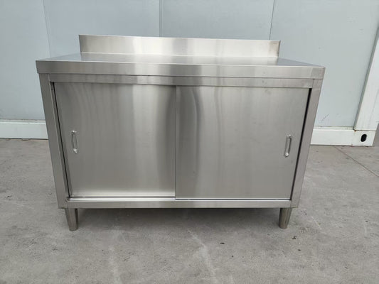 Stainless steel workbench with sliding doors front view

Restaurant prep table with built-in storage

Commercial kitchen stainless steel workbench

Side view of sliding door stainless work table

Heavy-duty garage workbench with stainless cabinet